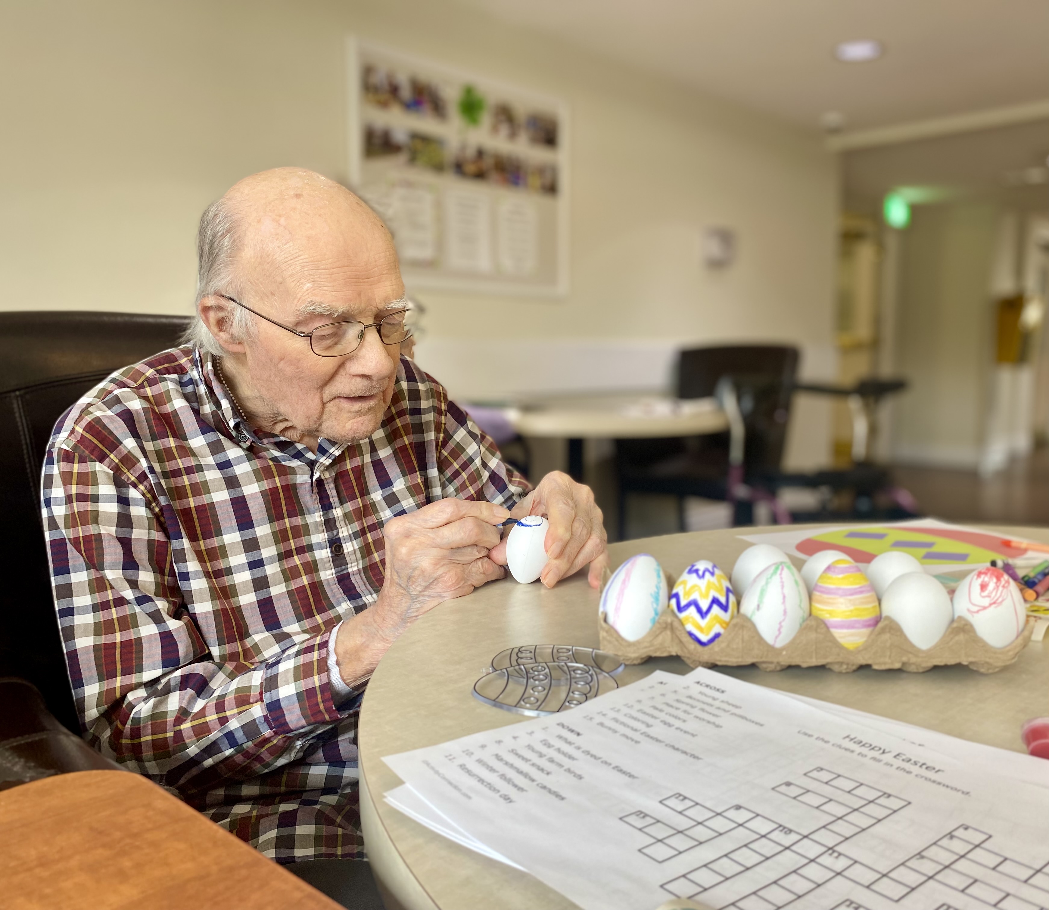 Residents decorating eggs