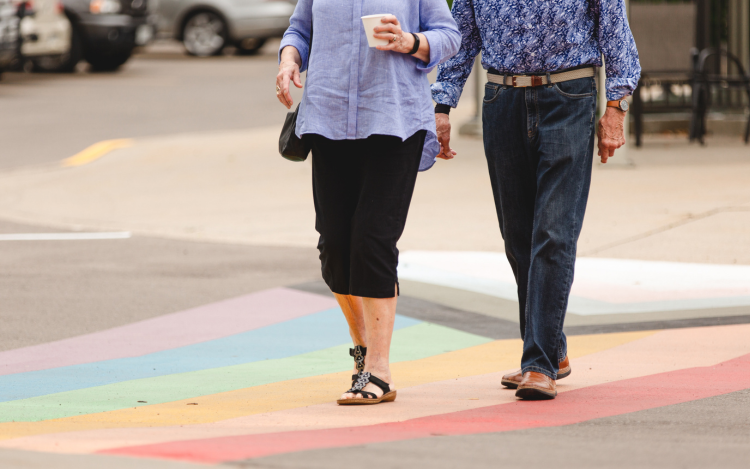 Residents walking to the cafe at Luther Village on the Park