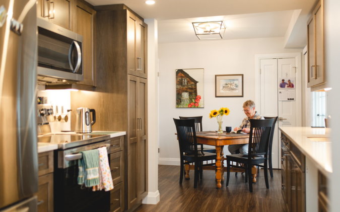 Resident enjoying their coffee in a Life Lease