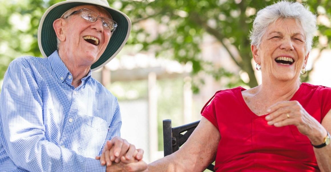 Eric and his wife Nancy laughing together