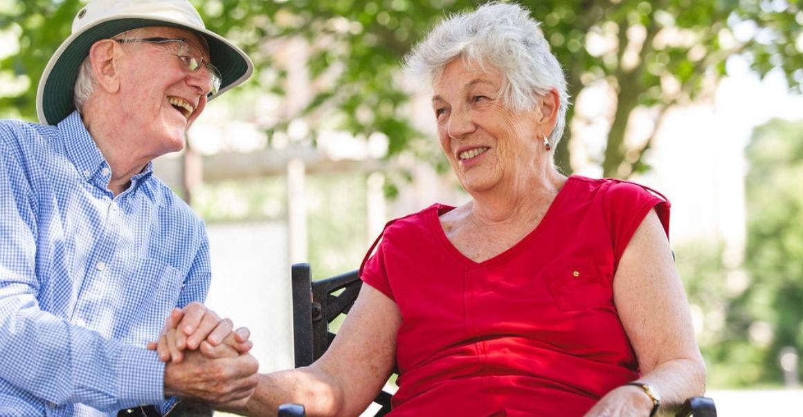 resident's Nancy and Eric laughing together 