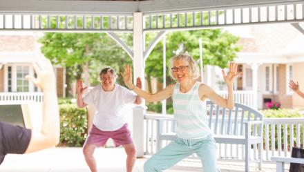 two residents doing yoga