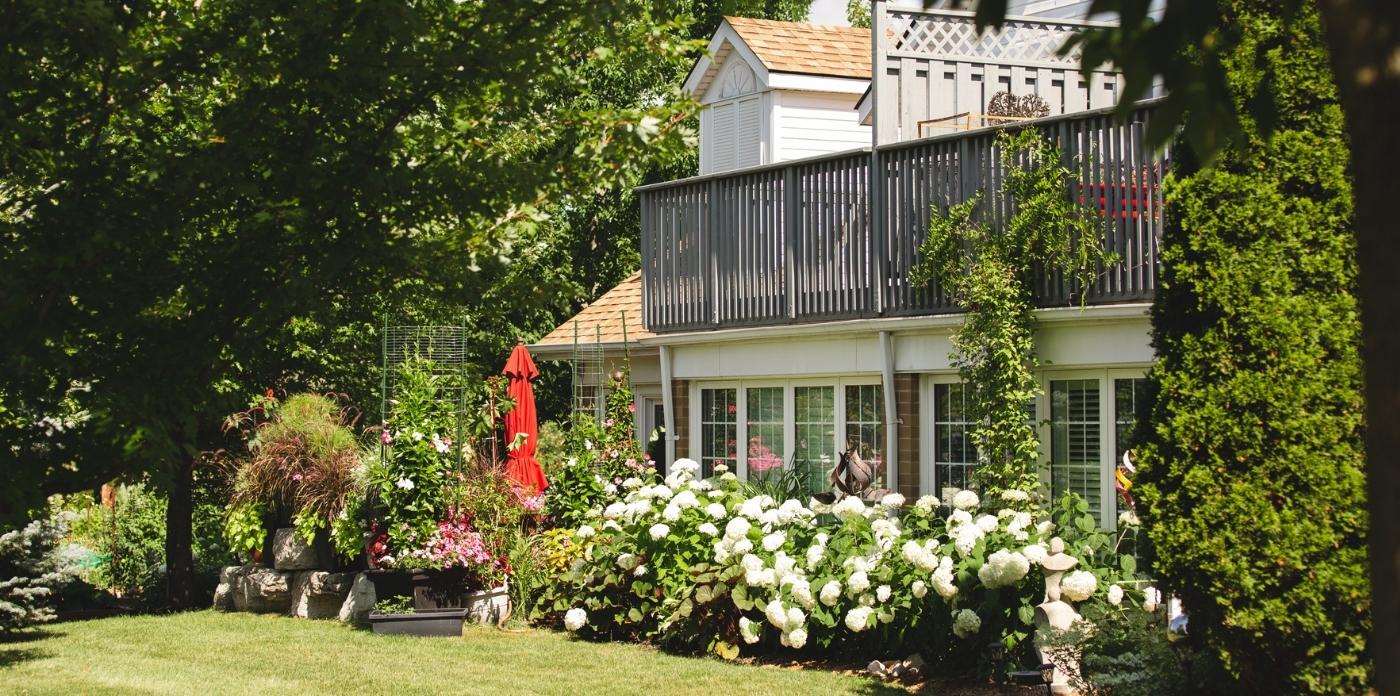 garden villa upper patio with flowers surrounding it