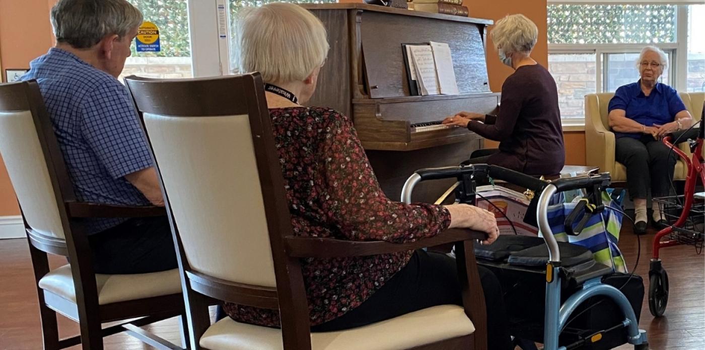 volunteer playing piano