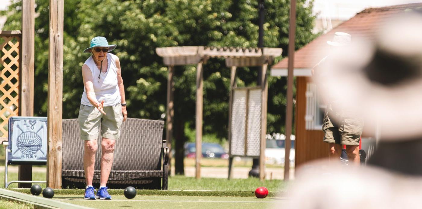 Image of residents playing games outside at Luther Village on the Park